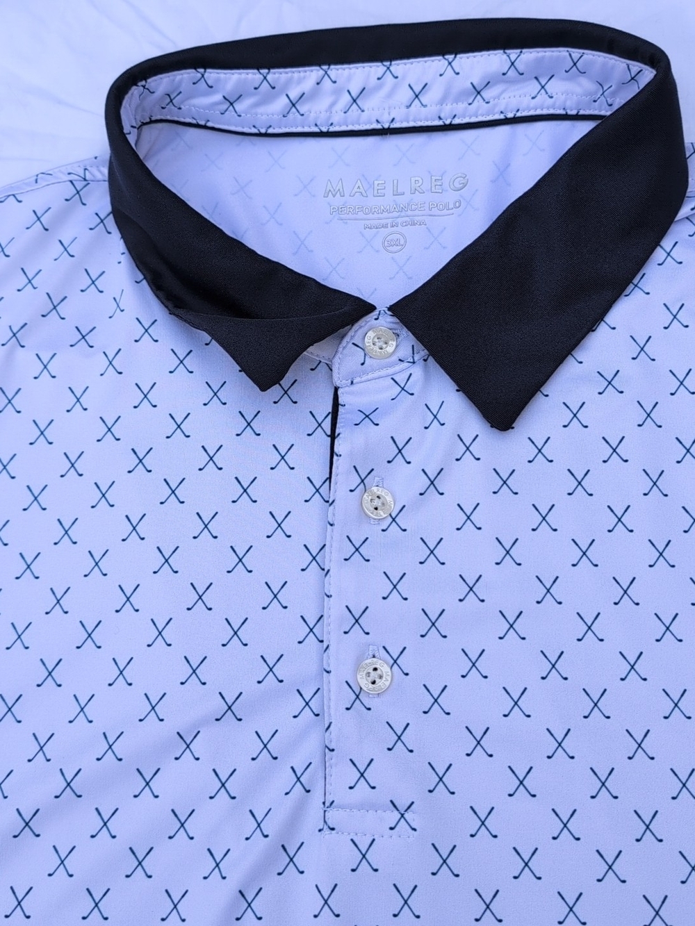 Maelreg White Performance Polo with Black Contrast Collar